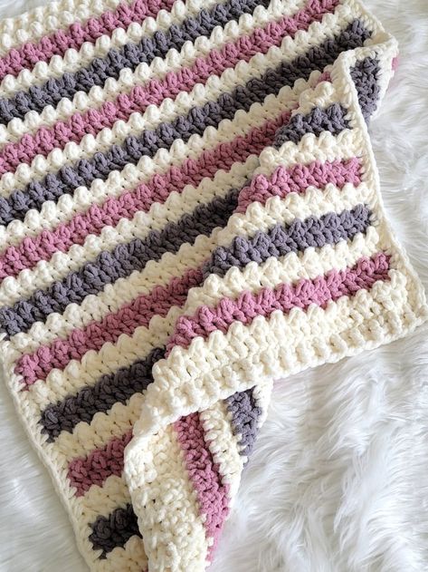 Try this gorgeous 6 weight Yarn Crochet Blanket Pattern for a cozy chunky crochet throw! Our chunky blanket pattern features easy crochet throw patterns perfect for modern haken designs. This crochet blanket pattern (easy to follow) transforms into a stunning throw blanket pattern that works beautifully as a baby blanket too - and it's totally free! Get ready to make your chunky crochet dreams come true with our beautiful crochet blanket designs. Jumbo Yarn Crochet Blanket Pattern Free, Bernat Velvet Crochet Blanket, Chunky Waffle Stitch Crochet Blanket, Bernat Super Bulky Crochet Blanket, Velvet Crochet Baby Blanket, Crochet Lap Blanket Patterns Free Chunky Yarn, Thick Crochet Blanket Pattern, Chunky Chenille Yarn Crochet Patterns, Fuzzy Crochet Blanket