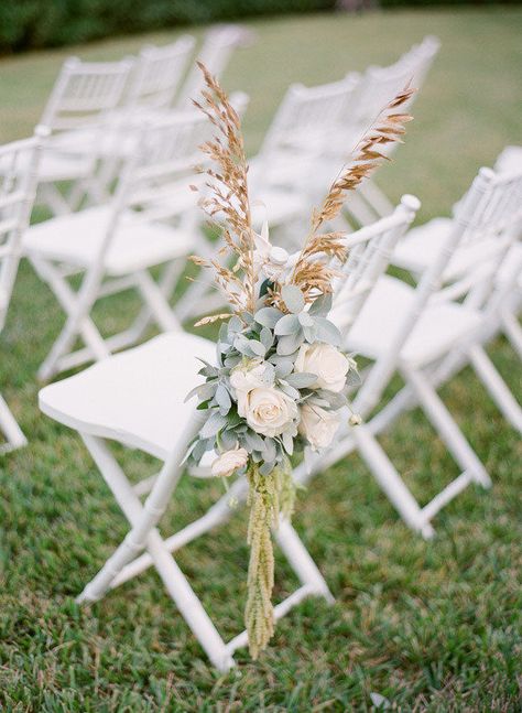 flower arrangement and pampas grass for wedding ceremony chairs #weddings #rosesandrings #weddingcenterpieces #weddingideas #himisspuff #bohemian #wedding Wedding Ceremony Chairs, Ceremony Chairs, Wedding Chair Decorations, Chair Decor, Grass Wedding, Wedding Aisle Decorations, Artificial Silk Flowers, Aisle Decor, Wedding Aisle