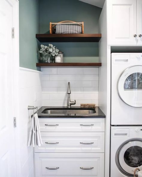 Laundry Room Sink Ideas: 10 Tips for Your Utility Space | Hunker Stacked Washer And Dryer With Sink, Laundry Room With Stackable Washer Dryer And Sink, Cabinet Over Stacked Washer And Dryer, Laundry Room Design Stackable With Sink, Stackable Washer Dryer Laundry Room Sink, Stackable Washer Dryer Laundry Room With Sink, Laundry Room With Stacked Washer Dryer, Laundry Room Stacked Washer And Dryer, Laundry Room Sink Ideas