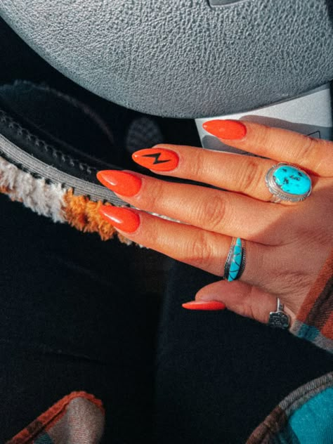 Nail Ideas Punchy, Western Themed Nail Ideas, Western Nail Ideas Almond Shape, Burnt Orange Western Nails, Oval Western Nails, Western Nails Orange, Lightening Bolt Nail Design Western, Punchy Western Nails Short, Red And Black Western Nails