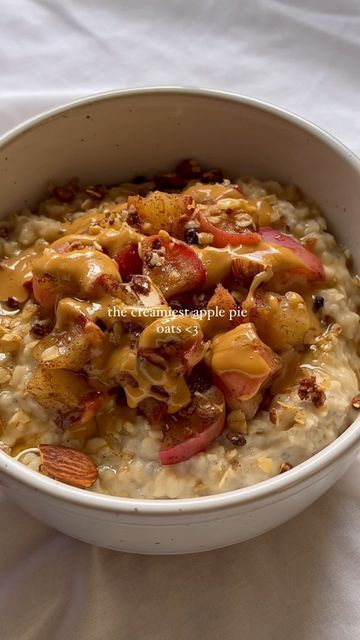 _wholesomepantry on Instagram: "the cosiest and creamiest oatmeal I’ve ever made. Yep, I did just say that 😊 ingredients: - 1/2 cup @ceresorganicsau rolled oats - 1 tsp chia seeds - 1 tsp hemp seeds - 1/2 mashed ripe banana - honey - 1 cup @oatly oat milk sautéed apples: - 1 chopped apple - cinnamon - maple syrup combine all the oats ingredients and bring to a boil, then simmer for about 5 minutes until creamy. To make the apples, combine the ingredients and microwave for 2 minutes. I topped mine with the apples, homemade pb granola (recipe in my feed), @mayversfood dark roasted pb, sea salt and maple syrup, soooo good!!" Creamiest Oatmeal, Sautéed Apples, Banana Honey, Apple Oatmeal, Honey Oats, Granola Recipe, Honey Oatmeal, Food Board, Granola Recipes