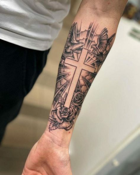 Cross tattoo photo Cross Arm Sleeve Tattoo, Cross With Background Tattoo, Cross With Lightning Tattoo, Tattoo Forearm Sleeve Men, Tattoo Ideas For Men Forearm Small, Male Cross Tattoos, Country Tattoo Ideas For Men, Guy Sleeve Tattoos, Men’s Cross Tattoos