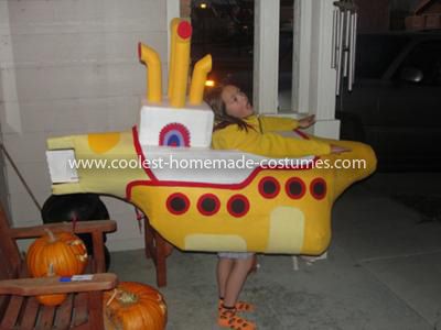 Homemade Yellow Submarine Costume: 8 Year old Caroline wanted to be something Beatles oriented. The decision was made to be 'The Beatles Yellow Submarine'. It took me about 3 days to construct. Submarine Costume, How To Make Yellow, Beatles Party, Cardboard Costume, Homemade Costume, Cute Website, Beatles Yellow, Homemade Costumes, Halloween Costume Contest