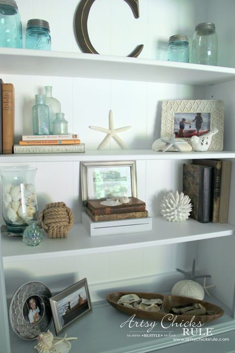 Coastal Styled Bookshelves (Decor Challenge) - #interiordesign #coastaldecor #styling artsychicksrule Styled Bookshelves, Bookshelves Decor, House Coastal, Shell Ideas, Decorating Bookshelves, Coastal Living Rooms, Coastal Bedrooms, Beach Cottage Decor, Beach House Interior