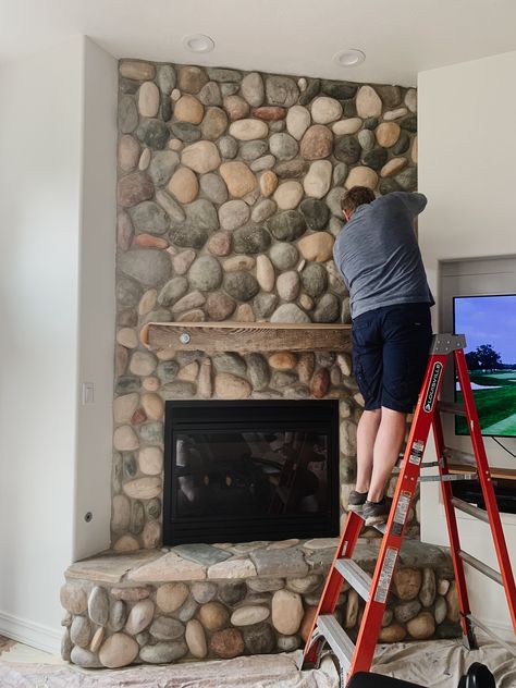 White Washed River Rock Fireplace, Living Room With River Rock Fireplace, Creek Rock Fireplace, Modern River Rock Fireplace, German Schmear River Rock Fireplace, Washed River Rock Fireplace, Painted Black Rock Fireplace, Paint River Rock Fireplace, River Stone Fireplace Makeover