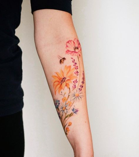 Wildflower Tattoo Forearm Color, Bee And Wildflower Tattoo, Watercolor Hand Tattoo, Polish Pottery Tattoo, Bug And Flower Tattoo, Watercolor Tattoo For Women Unique, Tattoo Daisies, Grandkids Tattoos, Bailey Tattoo