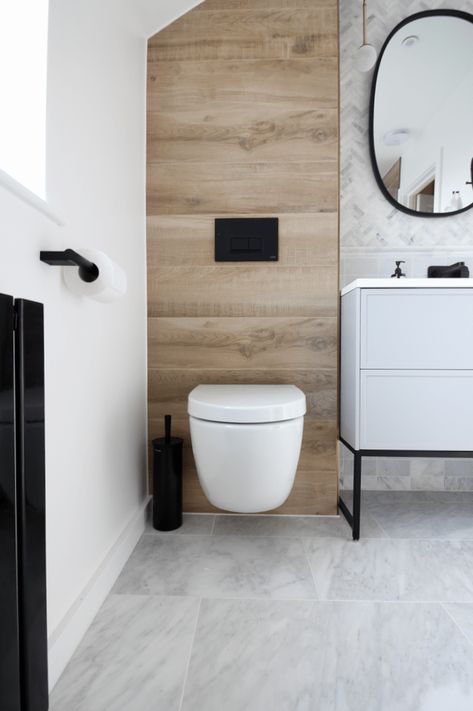 Minimalist Modern Marble and Wood small ensuite Bathroom with Black Accents Bathroom With Black Accents, Small Ensuite Bathroom, Modern Marble Bathroom, Small Ensuite, Modern Marble, Ensuite Bathrooms, Ensuite Bathroom, Wall Hung Toilet, Small Bathroom Design