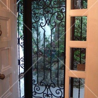 Wrought Iron Security Doors | Rivas Design Security Door Locks, Bathroom Countertops Diy, Wrought Iron Security Doors, Iron Security Doors, Patio Screen Door, Patio Door Handle, Patio Screen, Wrought Iron Door, Security Screen Door