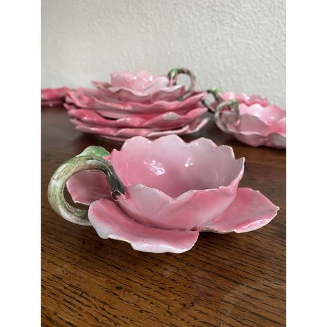 Set of Italian hand painted, handmade rose bud dessert/tea set. The teacups have curled petals with rosebud stem handles. Variations of color from deep rose to the softest pale pink showcase the hand painting. They are so lifelike and delicate! Incredible detail.   There is some chipping to some of the petals on the cups and two plates have hairline cracks. See photos.   There are 9 plates and 10 cups.   These would make an adorable spring table. Also imagine as precious for a child’s birthday d Vintage Pink Plates, Kawaii Tea Set, Flower Tea Set, Ceramic Sketchbook, Teacup Bouquet, Aesthetic Plates, Spring Ceramics, Bloom Party, Ceramic Aesthetic