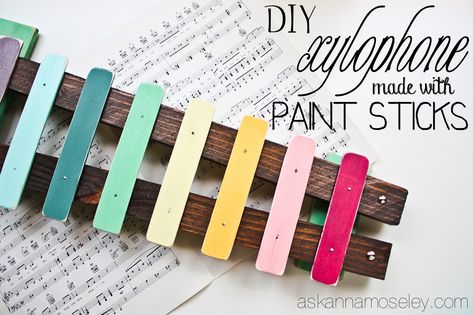 DIY xylophone made with paint sticks - Ask Anna Xylophone Craft, Diy Xylophone, Paint Stir Stick Crafts, X Is For Xylophone, Daisy Troop, Paint Stir Sticks, Paint Sticks, Front Door Makeover, Toy Instruments