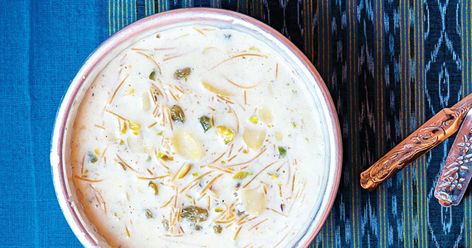 This Indian pudding of cardamom-spiced milk bolstered by toasted vermicelli noodles, dried fruit, and nuts is a Punjabi specialty. Gujarati Sweets, Indian Pastries, Indian Deserts, Spiced Milk, Sweets Indian, Milk Pudding Recipe, Indian Rice Pudding, Milk Curd, Indian Pudding