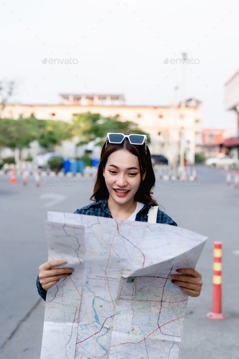 Looking At Map Pose Reference, Holding Map Pose, Person Holding Paper Reference, Holding A Map Reference, Person Holding Map Reference, A Man Holding A Paper, Person Holding A Flag Drawing, Holding Paper, Holding Paper Reference