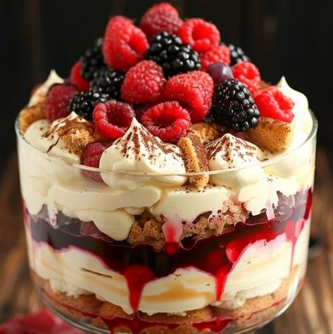 🍓🍰 Dive into layers of bliss with Berry Tiramisu Trifle! Luscious, fruity, and irresistible! #BerryDelicious #TiramisuTrifle Berry Tiramisu Trifle Recipe This trifle combines the classic flavors of tiramisu with the fresh zest of seasonal berries, making it a perfect dessert for any gathering. Ingredients: Mascarpone cheese: 250g Heavy cream: 240ml Powdered sugar: 75g Vanilla extract: 5ml Ladyfingers: 200g Mixed berries (strawberries, blueberries, raspberries): 300g Coffee (cooled): 240ml... Easy Berry Trifle Recipe, Tiramisu Trifle Recipe, Blueberry Trifle Recipe, Berry Tiramisu, Blueberry Trifle, Trifle Bowl Recipes, Tiramisu Trifle, Raspberry Trifle, Trifle Dessert Recipes