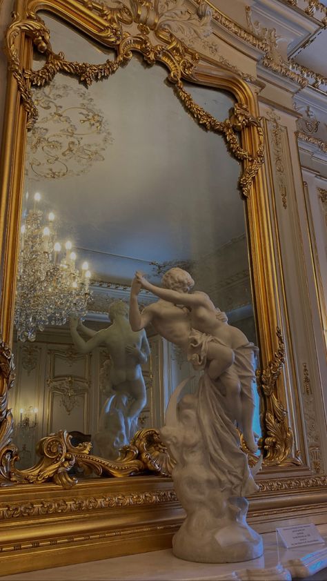 Dim light, gold frame, marble, chandelier, sculpture, Cupid Queen Marie Of Romania, Marie Of Romania, 1800s Aesthetic, Sculpture Architecture, Romania Bucharest, Aesthetics Art, Dark Mountains, Romania Travel, Royal Aesthetic