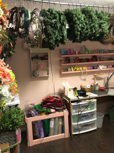 Craft Room Flower Storage Ideas, Wreath Craft Room Ideas, Organizing And Storing Artificial Flowers, Wreath Organization Storage Ideas, Garage Flower Shop, Flower Shop Organization, Wreath Storage Ideas Organizing, Flower Organization Ideas, Faux Flower Storage Ideas