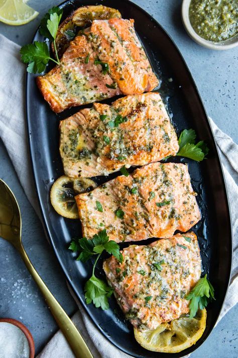 Easy and delicious pesto butter salmon is ready in under 30 minutes and calls for just 4 simple ingredients. High in protein and healthy fats, this is a great nutritious dish for meal prep or a quick dinner on busy weeknights. | howewelive.com Pesto Butter Salmon, Salmon With Pesto, Pesto Salmon Recipe, Pesto Butter, Pesto Salmon, Butter Salmon, Mexican Dish, Healthy Lunch Meal Prep, How To Make Pesto