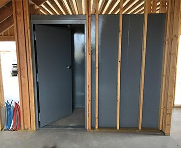 Hidden Storm Shelter Safe Room, How To Build A Safe Room, Safe Room Ideas Storm Shelters, Built In Safe Room, Hidden Storm Shelter, Safe Rooms In Houses Storm Shelters, Fireproof Safe Room, Small Safe Room Ideas, House With Safe Room Home Plans