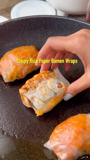 Michelle Belfrey on Instagram: "Crispy Rice Paper Spicy Ramen Wraps. Cook Buldak Noodles as directed and add American Cheese. In dampen rice paper, add ramen, scallions, mozerella #viralfood #viralrecipes #buldak #buldakramen #ricepaperrolls #ricepaperhack #ricepaperdumblings #kimchi #cheesebuldak" Mozerella Recipes, Crispy Rice Paper, Easy Homemade Snacks, Rice Paper Recipes, Homemade Cookbook, Overnight Oats Recipe Healthy, Spicy Ramen, Crispy Rice, Easy Snack Recipes