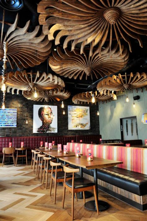 Nando's Leamington Spa, Coventry - United Kingdom (Nando's Global Art Initiative) Luxury Restaurant Interior, Ceiling Feature, Bar Deco, Restaurant Design Inspiration, Cafe Seating, Seating Ideas, Restaurant Seating, Lights Design, Luxury Bar