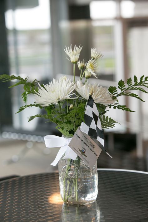 Race themed  centerpiece for cocktail table. Photo by Jennifer Driscoll. Race Car Wedding, Weeding Themes, Car Themed Wedding, Car Centerpieces, Race Wedding, Banquet Centerpieces, Car Wedding, Race Car Birthday Party, Race Party