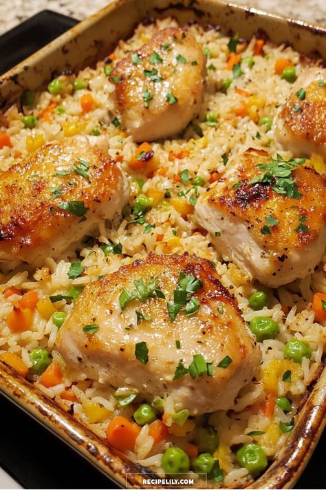 I'm sharing my go-to recipe for a comforting one-pan chicken and rice dish that's not only easy to make but incredibly delicious too! The chicken is perfectly seared and served atop a vibrant bed of seasoned rice mixed with colorful vegetables. It's a quick weeknight dinner that the whole family will love, and the clean-up is a breeze! Chicken And Rice Lunch Prep, Chicken And Carrot Recipes, Chicken And Rice Casserole Recipe, Baked Pesto Chicken, Chicken And Rice Dishes, Rice Side Dish Recipes, Chicken And Rice Casserole, Chicken Rice Casserole, Rice Casserole Recipes