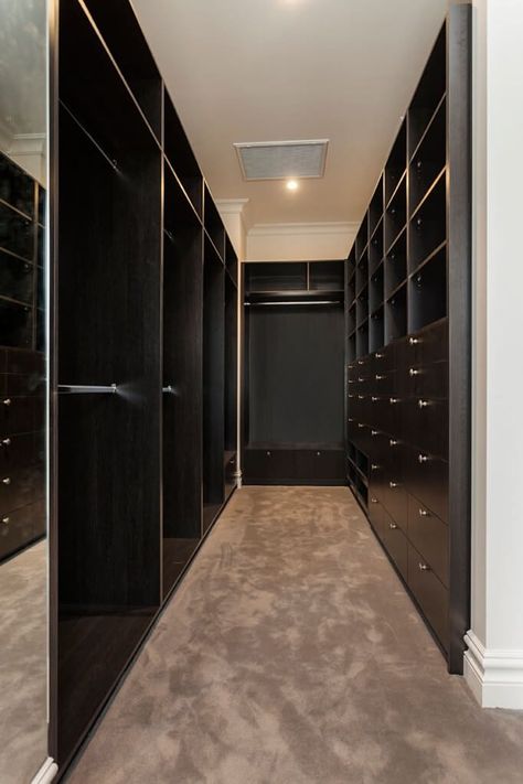 Nothing like the perfect amount of drawers and hanging space to make your walk-in robe not only look great but allow you to organise all your clothing and accessories. Black Built In Wardrobe, Walk In Robe Designs, Raked Ceiling, Bathroom Design Black, Walk In Robe, Simple Wardrobe, Wardrobe Cabinets, Hamptons House, Walk In Wardrobe