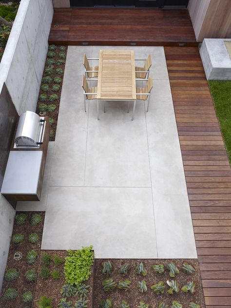 The juxtaposition of the smooth concrete, wood and the rows of plants is calming, relaxing and perfectly modern. Poured Concrete Patio, Paint Concrete Patio, Wood Walkway, Patio Pictures, Concrete Deck, Patio Design Ideas, Modern Patio Design, Concrete Patio Designs, Smooth Concrete