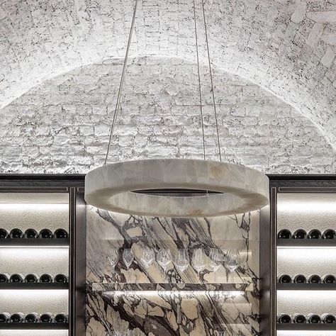 1508 London on Instagram: "B E S P O K E • Exquisite detailing in the wine room from our Portland Place project. Crafted around an extensive fine wine collection our designers restored the original brickwork with a lime wash finish to create a sense of depth and drama in the space. The focal point is the bespoke marble table that features a hidden sink and tap in the middle of the table. • • • #1508London #InteriorDesign #LuxuryDesign #WineCellar #Interiors #PrimeProperty #Bespoke #Refined #InteriorDesign #luxurylifestyle" Hidden Sink, 1508 London, Lime Wash, Wine Cave, Instagram B, Marble And Gold, Kitchen Marble, Wine Collection, Kitchen Cabinetry