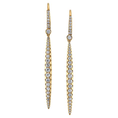 These gorgeous 18k yellow gold and diamond pave dangling earrings feature 1.31 carats of sparkling round brilliant cut diamonds! The elongated, linear design is so flattering and chic, they'll bring streamlined elegance and style to any outfit! Undeniably perfect for evening wear, these earrings can easily be worn with a crisp, white collared shirt or black sweater for an ultra-sophisticated daytime time look as well. Whether for yourself or to give to a loved one, these versatile earrings will White Collared Shirt, Linear Design, Dangling Earrings, Fine Jewelry Collection, Round Brilliant Cut Diamond, Brilliant Cut Diamond, Pave Diamonds, Evening Wear, Round Brilliant