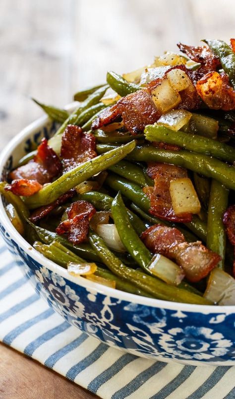 Slow Cooker Barbecued Green Beans are sweet and tangy with lots of smoky bbq flavor. Made from canned beans, they are a cinch to make and are a great side dish for potlucks and family meals. They are kind of like the flavor of baked beans, only with green beans. What’s not to love about that? Sweet And Sour Green Beans, Montana Recipes, Princess Recipes, Asian Sides, Resep Koktail, Potluck Side Dishes, Smores Dessert, Pasta Vegetariana, Resep Salad