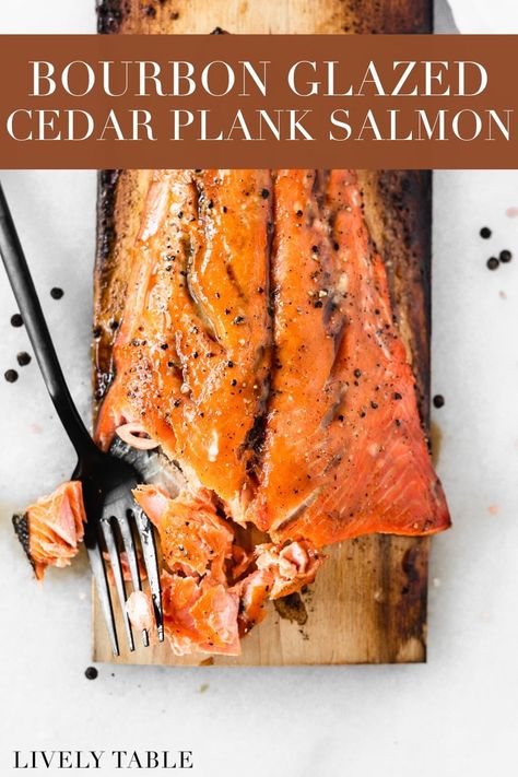 5 ingredient grilled cedar plank salmon with a delicious honey bourbon glaze is an easy recipe that's perfect year-round! (dairy-free, nut-free, gluten-free) Plank Salmon Oven, Salmon Recipe Pan, Cedar Plank Grilled Salmon, Bourbon Glazed Salmon, Oven Salmon, Plank Salmon, Salmon Glaze Recipes, Cedar Plank Salmon, Honey Bourbon