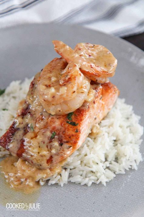 Cajun salmon and shrimp with a homemade cream sauce! The ultimate dinner recipe for two. #cajun #salmon #shrimp #salmonandshrimp #cajunsalmon #lowcarb Cajun Salmon And Shrimp, Dinner Recipe For Two, Shrimp Cream Sauce, Salmon With Cream Sauce, Cajun Shrimp Recipes, Cajun Salmon, Recipe For Two, Homemade Cajun Seasoning, Sauce For Salmon