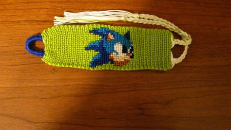 made this as a custom order with embroidery floss using an alpha pattern Sonic Alpha Pattern, Alpha Pattern, Alpha Patterns, The Hedgehog, Embroidery Floss, Friendship Bracelet, Sonic, Friendship Bracelets, Custom Orders