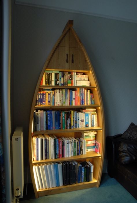 Boat bookcase Canoe Shelves, Unusual Bookcase, Boat Bookcase, Boat Furniture, Creative Bookcases, Cosy Reading Corner, Painting Bookcase, Antique Bookcase, Small Doors