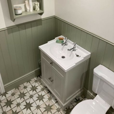 Kelly from @penhower_newydd on Instagram used our Scintilla Olive Green Star Pattern Tiles to create a charming statement in her bathroom. Our Scintilla Star Pattern Tiles are one of our bestsellers, and it isn’t hard to see why! They have a vintage design with an aged effect, which is perfect for creating a charming statement. Kelly used the Olive Green colour to add even more character to her space. Tiling In Shower Cubicles, Olive Green Cloakroom Toilet, Green Panelled Bathroom, Green Cloakroom Toilet, Olive Bathroom Ideas, Scintilla Tiles, Olive Bathroom, Olive Green Bathroom, Olive Green Bathrooms