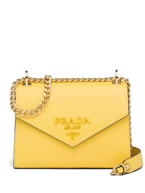 Luxury Italian heritage and expert artisanal craftsmanship lie at the heart of Milanese fashion house Prada's coveted design aesthetic, like this sunny yellow Monochrome Saffiano Leather Bag. Featuring a foldover top with magnetic closure, gold-tone hardware, an internal logo stamp, a sliding chain and leather shoulder strap and a tone-on-tone lettering logo appliqué on the front. Milanese Fashion, Products Aesthetic, Victoria Secret Swimwear, Prom Bag, Yellow Purse, Italian Heritage, Lettering Logo, Sunny Yellow, Yellow Aesthetic