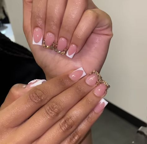 Short Nail Set With Rhinestones, Gold Short French Nails, White French Tip With Gold Gems, Gold Nail Set Short, Gold Bling French Tip Nails, Gold Rhinestone French Tip Nails, White Nails With Gold Charms, Short Gold French Tip Nails, Gold And Black French Tip Nails