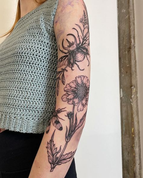 - P H I A - on Instagram: “First session on what will be a full sleeve of bugs and plants 🌱 This time around we did a rhino beetle, crocosmia, sage, dragon fly, and…” Rhino Beetle, Nyc Tattoo, Bug Tattoo, Dragon Fly, Floral Sleeve, Flower Tattoos, Future Tattoos, Tattoo Studio, Piercing Jewelry