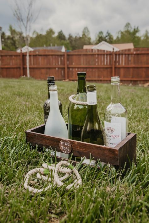 Engagement Party Ring Toss, Outdoor Wedding Lawn Games, Beach Games Wedding, Diy Garden Games Wedding, Wedding Ring Toss Game, Wine Bottle Ring Toss, Bottle Ring Toss Game Diy, Backyard Engagement Party Games, Ring Toss Wedding