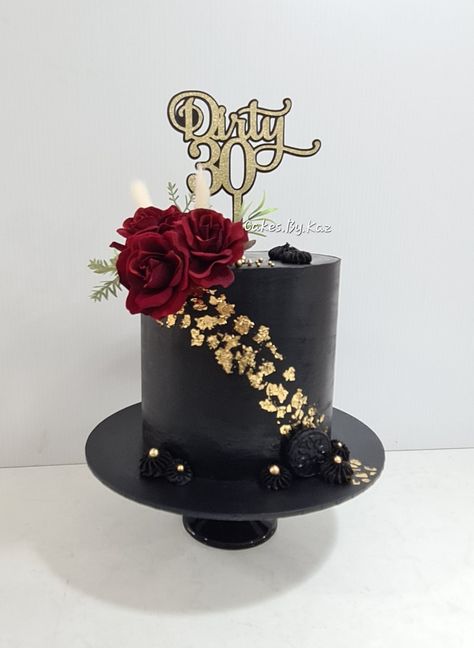 Black 30th birthday cake with gold leaf Black Red Gold Cake, Black And Gold Cake Design, Black And Gold Cake Birthday For Women, Dirty 30 Birthday Cake, Black And Gold Birthday Cake, Black Birthday Cake, Birthday Cake For Women Elegant, Dirty 30 Birthday, Black And Gold Birthday