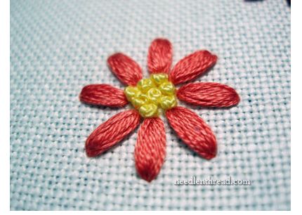 A trick for evenly spaced flower petals · Needlework News | CraftGossip.com Machine Embroidery Thread, Embroidery Stitches Tutorial, Embroidery Videos, Hand Embroidery Projects, Learn Embroidery, Paper Embroidery, Brazilian Embroidery, 자수 디자인, Hand Embroidery Stitches