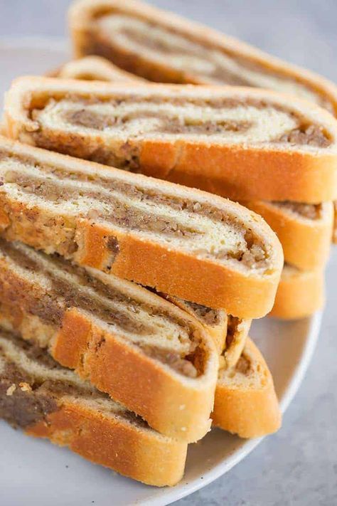 A plate with slices of nut roll. Recipe With Sour Cream, Nut Roll Recipe, Nut Roll, Brown Eyed Baker, Holidays Recipes, Nut Rolls, Fresh Cake, Vegetarian Cake, Roll Recipe