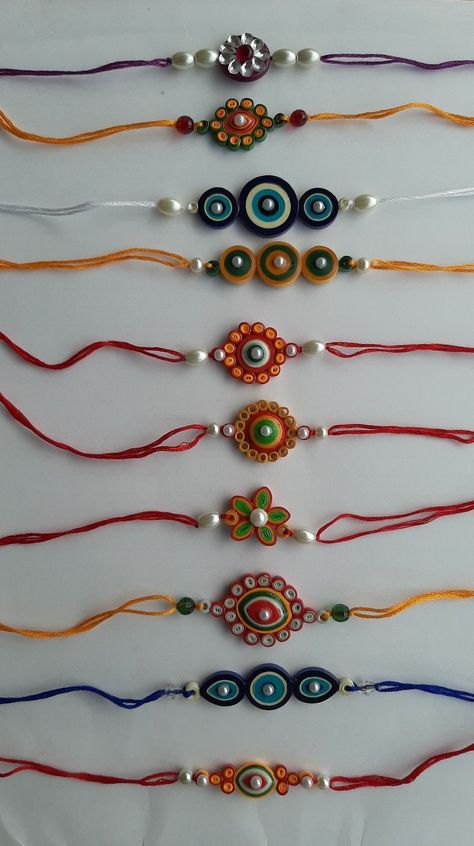 Quilling Paper Art/very beautiful paper craft Quiling Rakhi Ideas, Quilling Rakhi Ideas, Paper Quilling Rakhi Design, Raki Design, Raki Making Ideas, Quelling Rakhi, Quilling Rakhi Handmade, Diy Rakhi Ideas, Rakhadi Designs