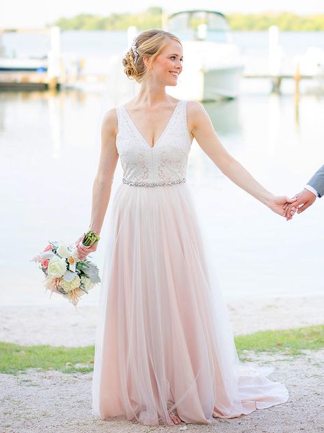 Flow down the ceremony aisle in a pink, sheer chiffon wedding dress to showcase personal style and beauty. Blush Color Wedding Dress, Wedding Dresses Mermaid Bling, Light Pink Wedding Dress, Pale Pink Weddings, Colored Wedding Gowns, Pink Wedding Gowns, Blush Pink Wedding Dress, Second Wedding Dresses, Colored Wedding Dress