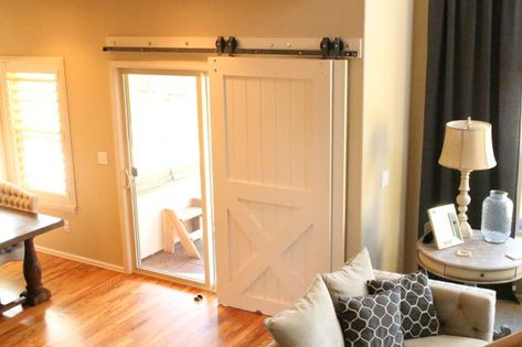 Barn Door On Sliding Glass Door, Sliding Barn Door Over Sliding Glass Door, Farmhouse Sliding Door Living Room, Barn Door Over Sliding Glass Door, Window Covering For Slider Doors, Sliding Glass Door Barn Door Cover, Barn Doors For Sliding Patio Door, Arcadia Door Coverings, Glass Sliding Door Coverings