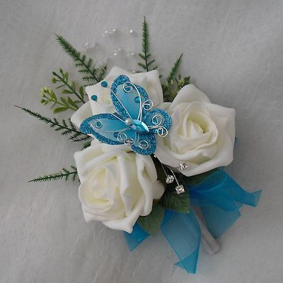 ... FLOWERS - LADIES IVORY AND Butterfly Bautizo, Butterfly Corsage, Turquoise Corsage, Diy Wipes, Hand Corsage, How To Make Corsages, Wrist Corsage Prom, Flowers Theme, Silk Wedding Flowers