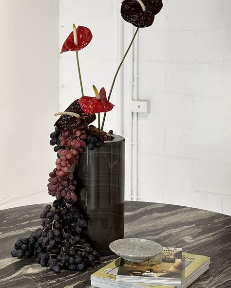 Design week work for @just__adele ~ We gave the gallery a reshuffle to create a better flow in the space and highlight some of the beautiful pieces that launched just in time for @ngvmelbourne design week. We finished the space with an edit of bespoke ceramics, our favourite @anniepaxtonstudio lamp and arrangement of clusters of grapes for that extra Italian touch 🇮🇹 Grazie Adele! X the KB studio team Garden Of Eden, Design Week, Just In Time, The Space, Adele, The Gallery, In Time, Eden, Floral Arrangements