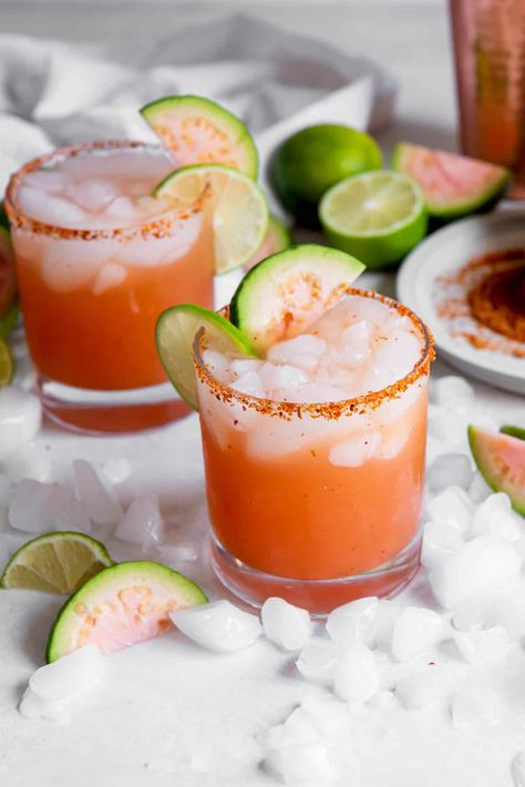 This easy guava margarita cocktail comes together in 5 minutes or less with guava nectar, tequila and a few other basic ingredients. A fun summer cocktail! Guava Margarita Recipe, Fun Summer Cocktail Recipes, Guava Margarita, Guava Nectar, Pitcher Of Margaritas, Orange Liquor, Best Summer Cocktails, Guava Fruit, Pink Guava