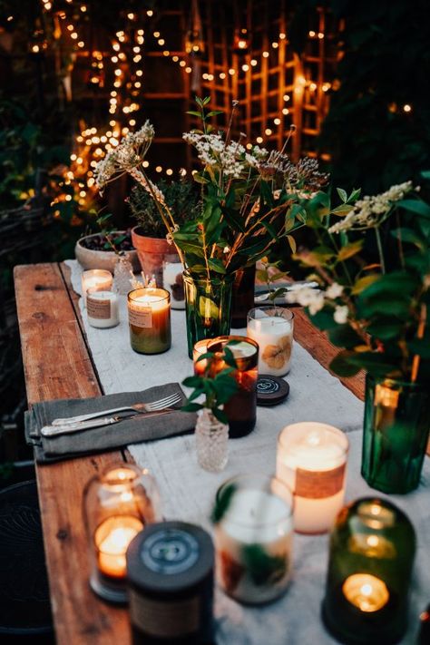 A beautiful tables cape including foliage in handmade green glass vases, natural handmade candles using essential oils, linen napkins, twinkly fairy lights and more. This links to a journal article about throwing a sustainable candle-lit dinner! Handmade Glassware, Candle Lit Dinner, Autumn Shoot, Lavender Candles, Green Journal, Repurposed Wine Bottles, Spa Candle, Ancient Trees, Candle Flame