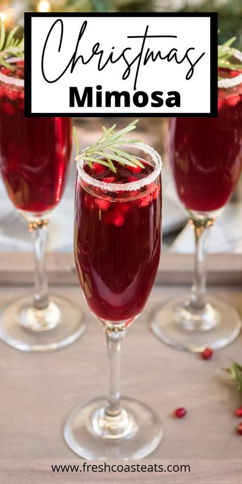 Christmas Mimosa in a champagne flute with a sugar rimmed glass and sprig of rosemary on top. Mimosa Recipe Christmas, Christmas Mimosa Recipe, Christmas Morning Mimosa, Christmas Mimosas, Pomegranate Mimosa, Xmas Drinks, Christmas Drinks Recipes, Christmas Punch Recipes, Mimosa Recipe